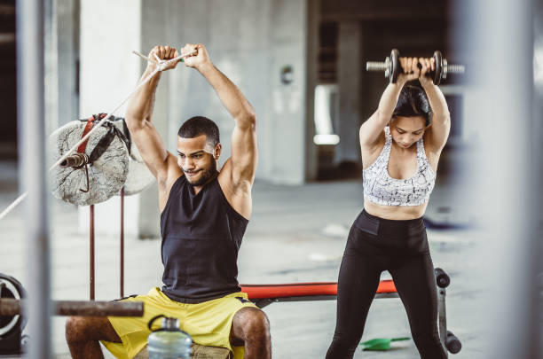 istock Two People Working Out in The Gym 1094494616