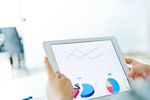 istock Businesswoman holding a digital tablet working 1094499574