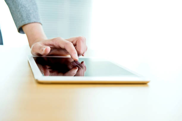 istock Woman hand toching digital tablet 1094499770