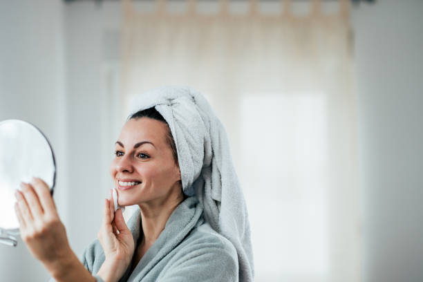 istock Image of a smiling woman cleaning her face, copy space. 1094500310