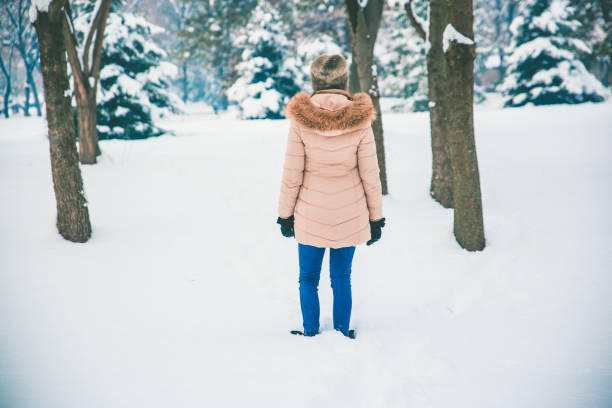 istock Young woman in snow 1094501064