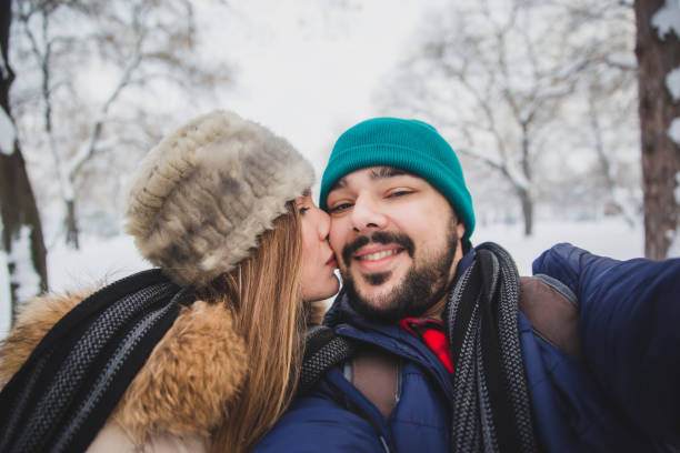 istock Happy couple taking selfies 1094501262