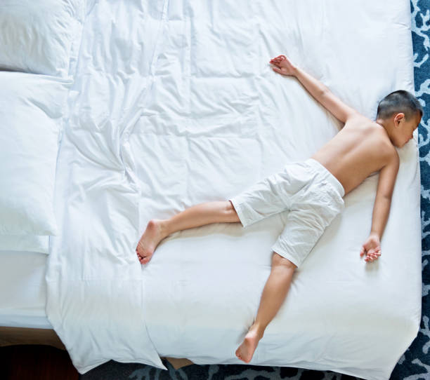 istock Top view of little boy sleeping 1094501302
