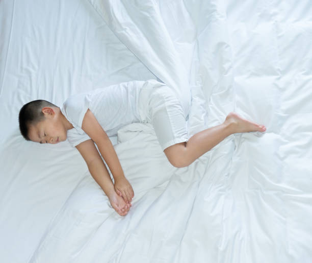istock Top view of little boy sleeping 1094502396