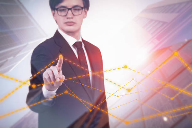 istock Businessman in glasses using graph in city 1094504250