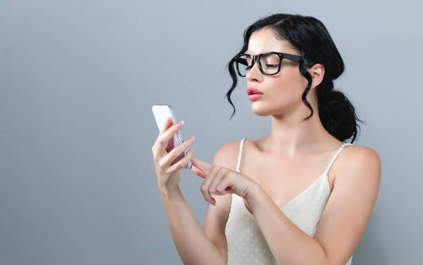 istock Young woman using her phone 1094504964