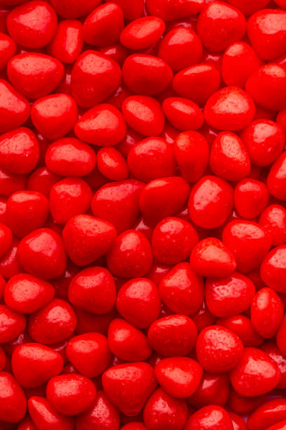 istock Red cinnamon heart shaped candy for Valentine's day 1094507342