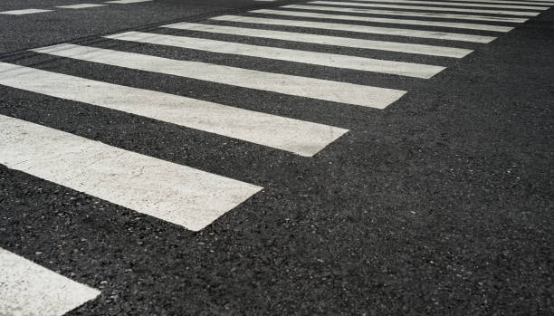 istock pedestrian pathway on a street crossing 1094508314