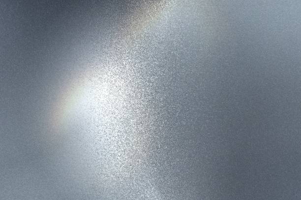 istock Light shining on rough dark gray steel floor texture, abstract background 1094509302