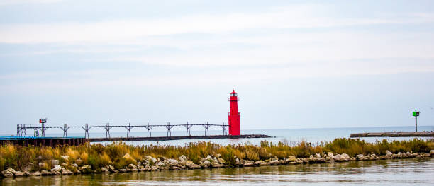 istock Algoma, Wi. lighthouse on Lake Michigan on a cloudy day 1094510858