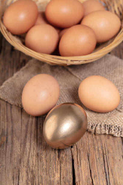 istock brown and golden chicken eggs 1094511792