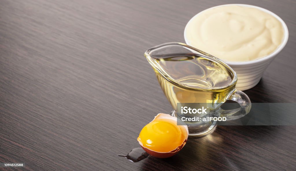 ingredients for making mayonnaise ingredients for making mayonnaise on wooden background Mayonnaise Stock Photo