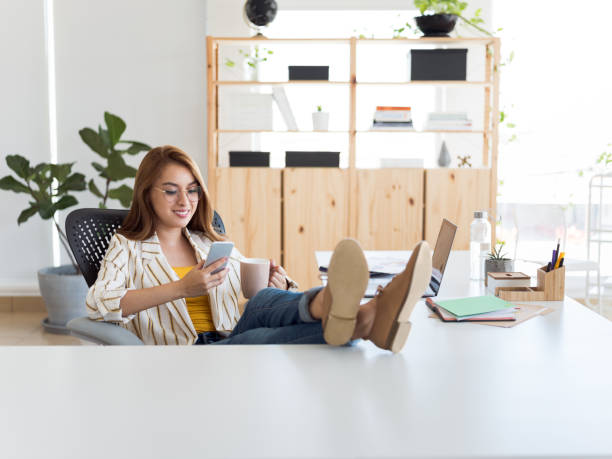 istock Millennial woman relaxing using cellphone 1094523054