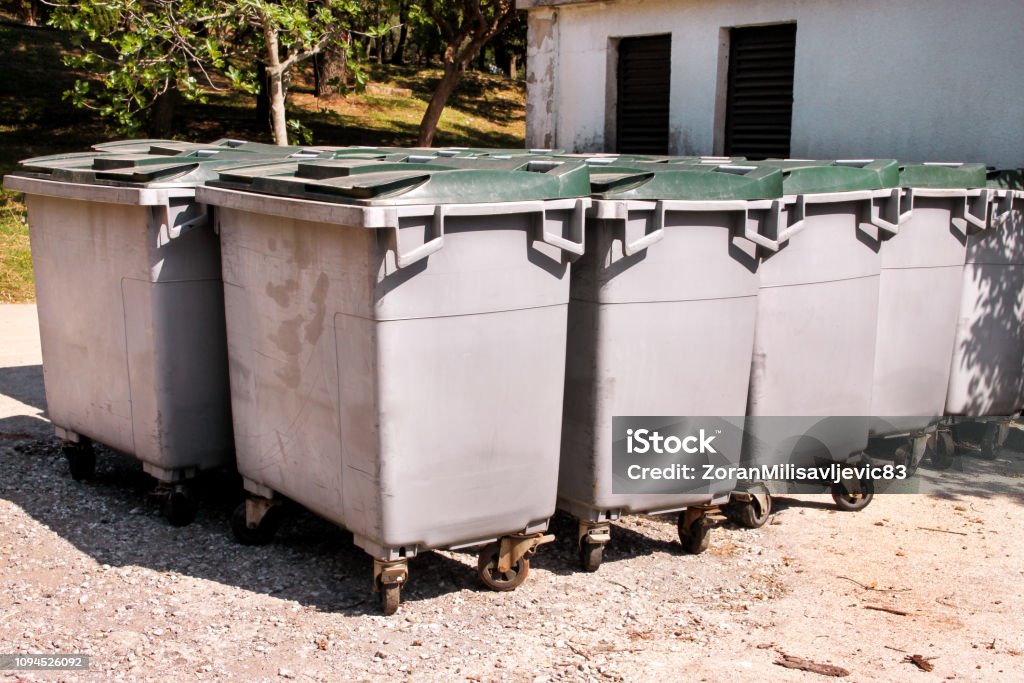 https://media.istockphoto.com/id/1094526092/photo/large-garbage-containers-trash-dumpsters-and-bins-standing-in-row-orderly-stowed-garbage-cans.jpg?s=1024x1024&w=is&k=20&c=4ltPPR9OgJTBgSB556cFVlHQKtjY1R8BG4qIHpyqRuQ=