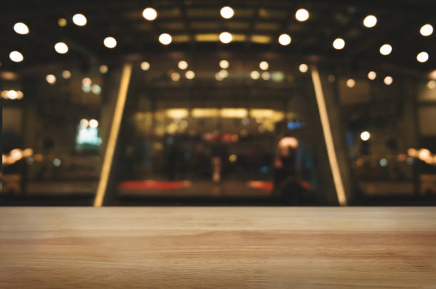 istock empty wood table with night street market background. 1094530484