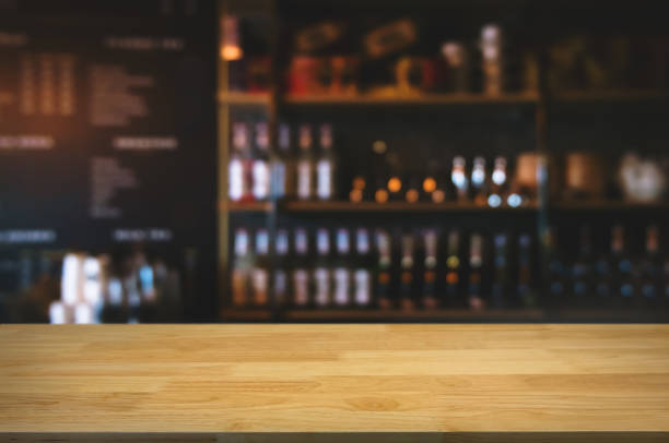 istock empty wooden plank with blurred cafe bar background. 1094530510