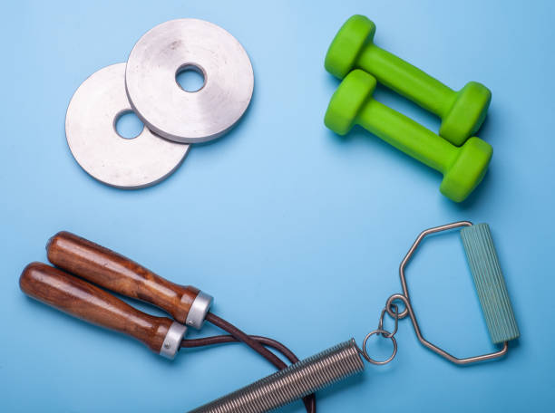 istock fitness equipment on bright background 1094532190