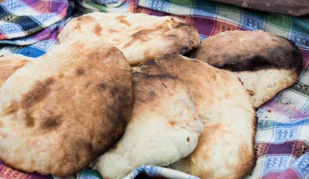 istock Making bread in tandoor oven 1094540790