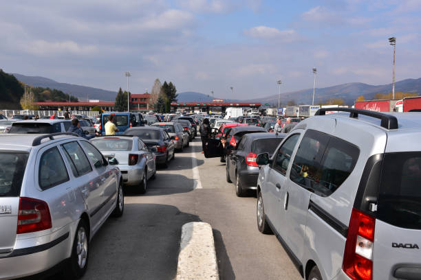 Serbian state border check-point Kalotina, Bulgaria - October 20, 2018: Mile long lines of cars waiting hours before Serbian state border check-point to enter the country schengen agreement photos stock pictures, royalty-free photos & images