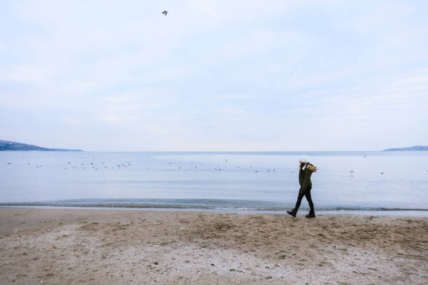 istock Young woman looking at the Ocean 1094544214
