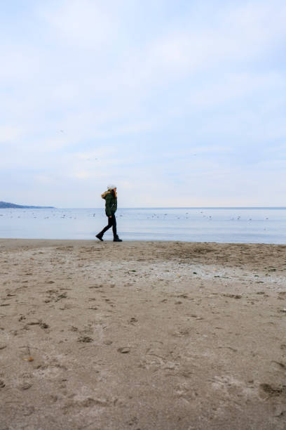 istock Young woman looking at the Ocean 1094544370