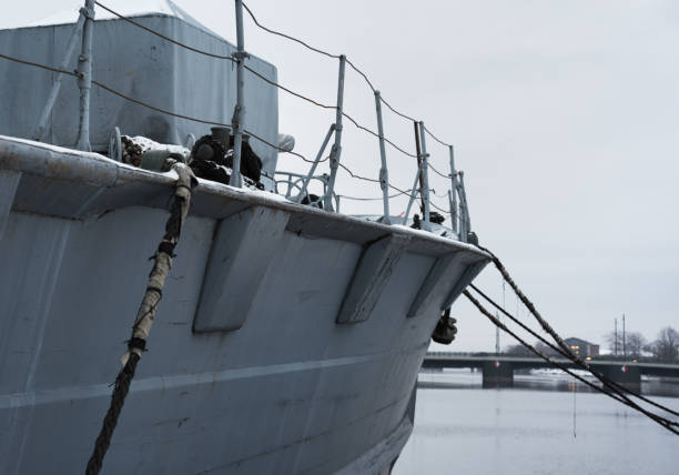 istock Grey ship in a city bay. 1094547878