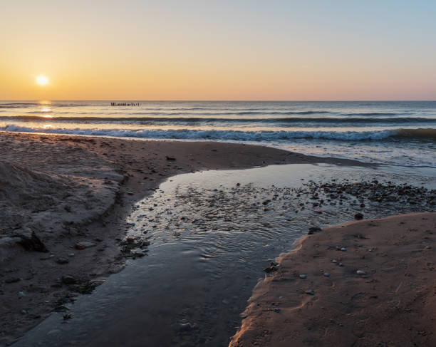istock Mouth of small river. 1094547958