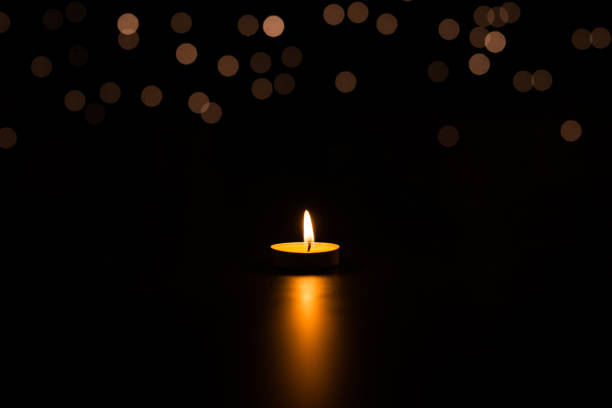 Blurry sparkler burning on a black background