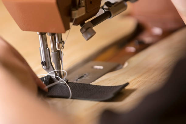 istock Leather Being Stitched on a Commercial Sewing Machine 1094557346