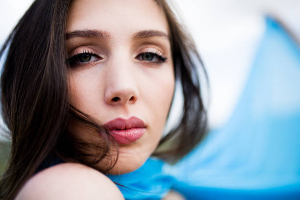 istock woman meditating in nature 1094558350