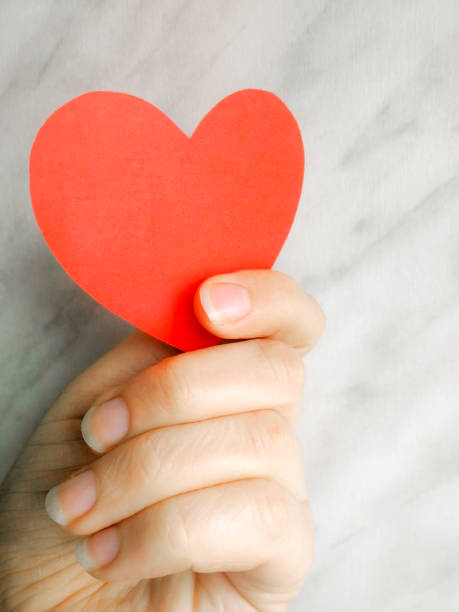 istock Red heart in hand 1094560864