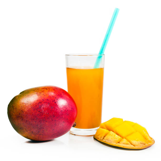 istock Mango and a glass of mango juice 1094561034