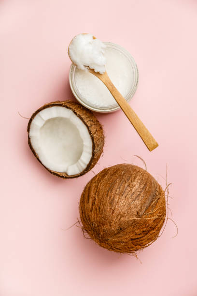 istock Coconut oil and fresh coconuts, flat lay 1094563726