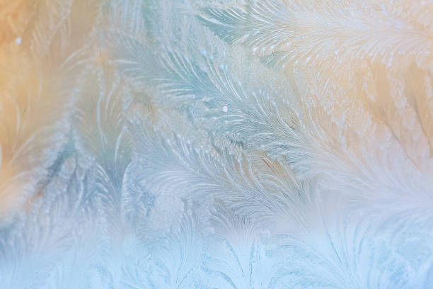 istock Colorful frosty pattern on the window 1094568158