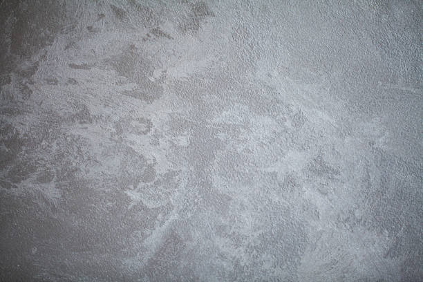 istock Gray concrete wall, abstract texture background. Wall in modern office 1094570712