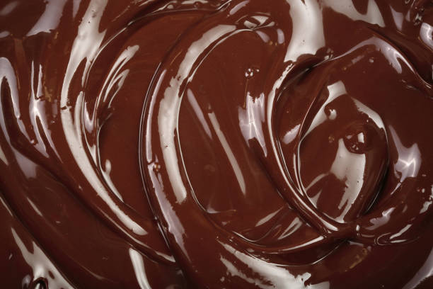 istock Melted chocolate swirl as a background closeup 1094578796