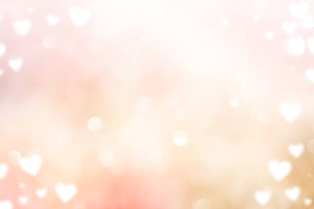 abstrakcyjne rozmycie piękny różowy gradient kolorów i blask flash świecące tło z ilustracją biały kształt serca światło i walentynki 14 lutego koncepcji - miłość stock illustrations