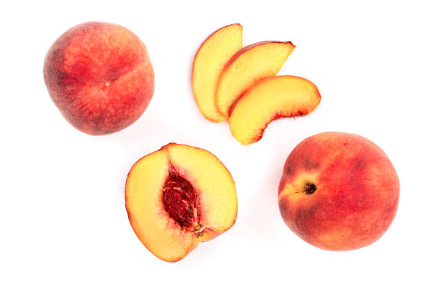 istock ripe peaches isolated on white background. Top view. Flat lay pattern 1094584060