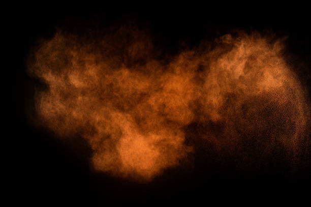 Photo of Orange powder explosion.