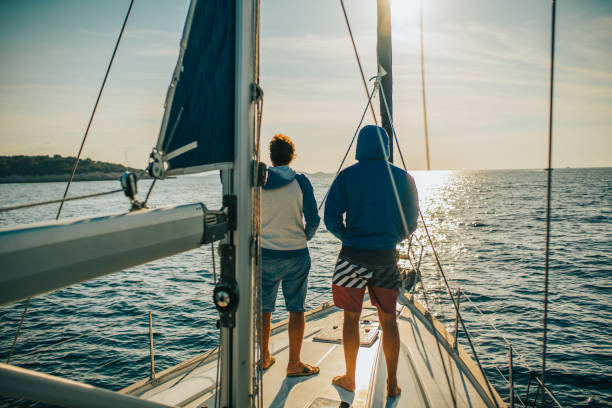 istock Two tourists standing on sailing boat, Croatia 1094598008