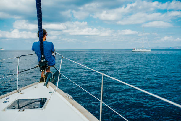 istock Man sitting on bow in Croatia 1094598624