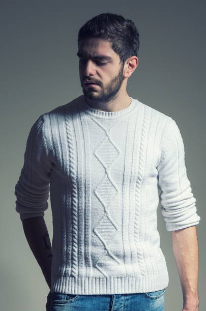 istock Sad Young Man Standing Against Gray Background 1094598792