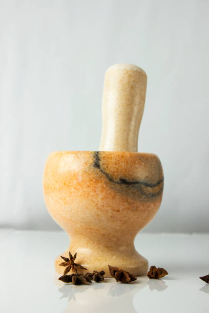 istock star anise near a mortar on a white background 1094598822
