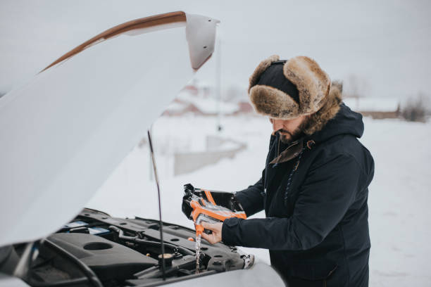 istock man preparing your car for winter 1094610392