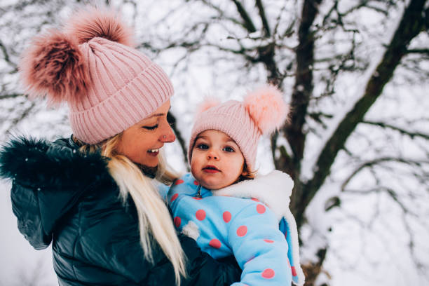 istock Mother and baby enjoying a sleigh ride 1094610934
