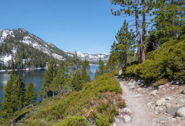 istock Snow Covered Mountain And Lake Views Along Hiking Trail 1094615028