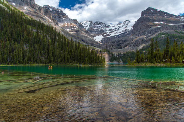 istock Lake Ohara hiking trail in cloudy day in Spring, Yoho, Canada. 1094618784