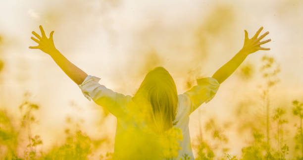 istock Woman with raised arms 1094622732