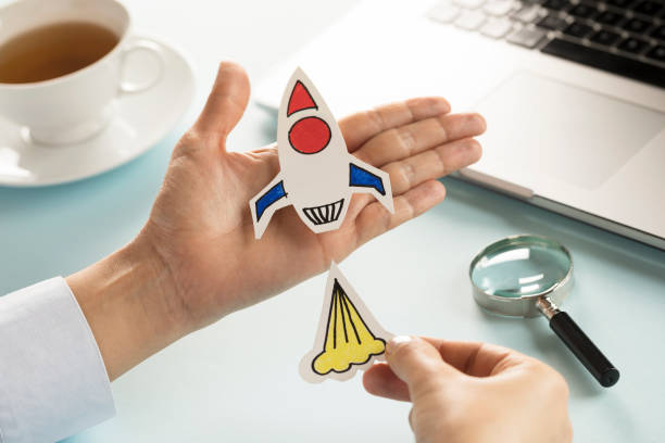 istock Business Person with Startup Rocket 1094623134