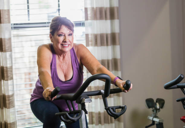 istock Senior woman exercising in a gym 1094632804